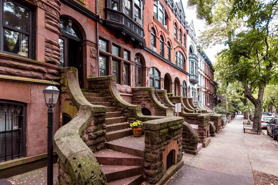 <p>getty</p> Stock image of a Brooklyn brownstone