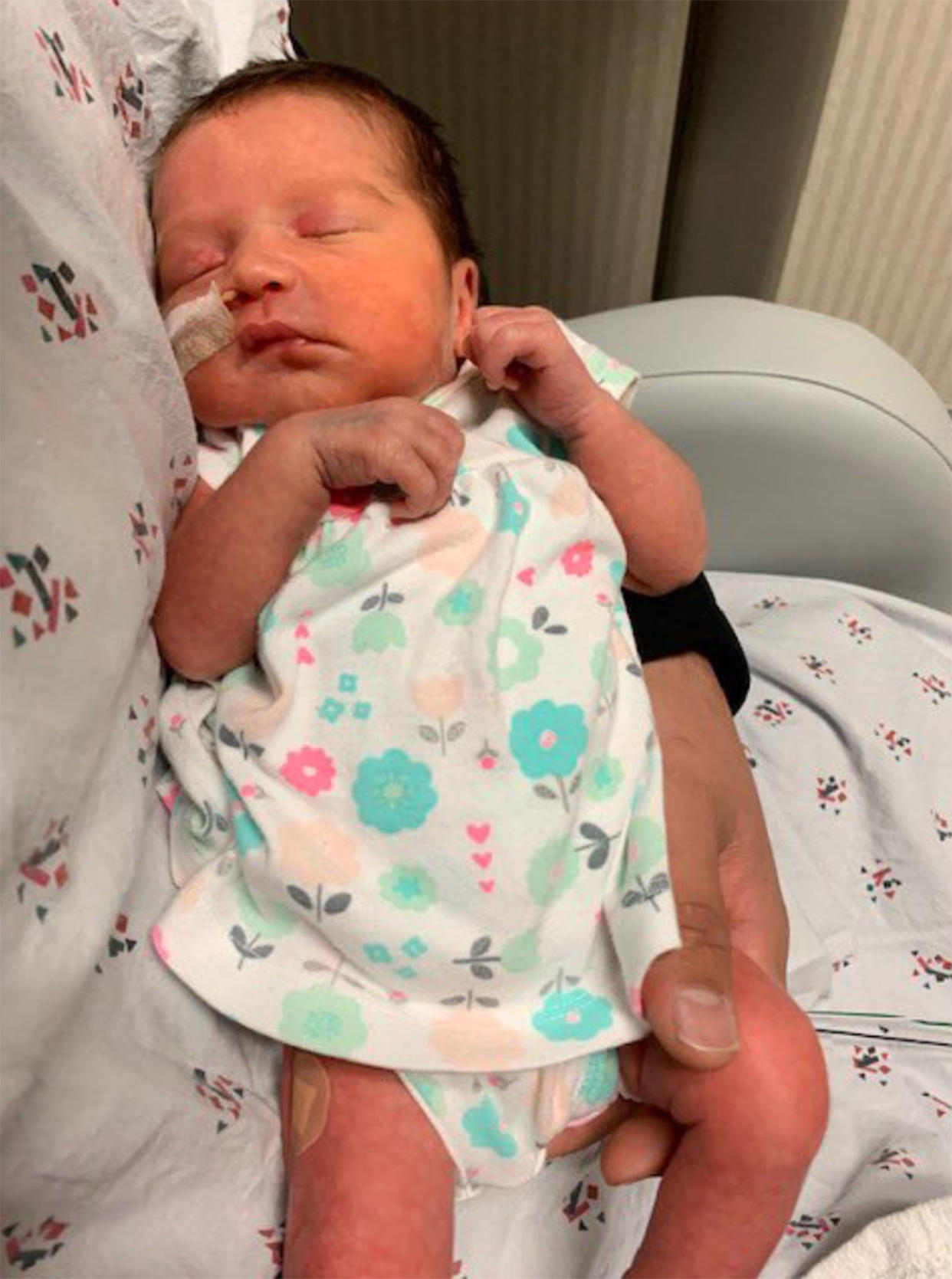 Analia Acevedo Castaneda was flying high after being born ... and then needed some time to sleep off the excitement. (Atlanta Airport)