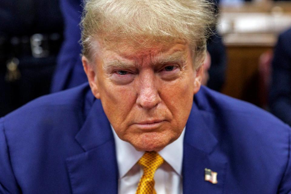 Trump sits at the defense table in Manhattan criminal court on 7 May (Sarah Yenesel/Pool Photo via AP)