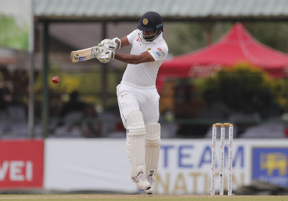 Sri Lanka's Dimuth Karunaratne plays a shot during the first day of the second test cricket match between Sri Lanka and New Zealand in Colombo, Sri Lanka, Thursday, Aug. 22, 2019. (AP Photo/Eranga Jayawardena)