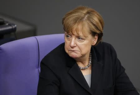 German Chancellor Angela Merkel attends a session of the German lower house of parliament, the Bundestag, in Berlin, Germany, January 13, 2016. REUTERS/Fabrizio Bensch