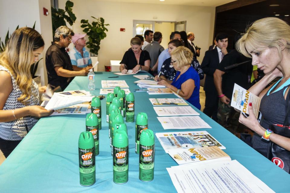 <span class="caption">The mosquito spray OFF! was handed out for free at the Zika Virus Town Hall Meeting at Waverly Condominiums in 2016.</span> <span class="attribution"><a class="link " href="https://www.gettyimages.com/detail/news-photo/woman-looking-at-the-free-mosquito-spray-off-being-given-news-photo/917609734?adppopup=true" rel="nofollow noopener" target="_blank" data-ylk="slk:Jeffrey Greenberg/Universal Images Group via Getty Images;elm:context_link;itc:0;sec:content-canvas">Jeffrey Greenberg/Universal Images Group via Getty Images</a></span>