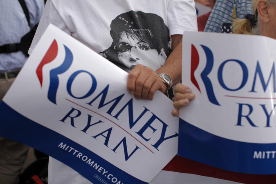 A supporter wears a Sarah Palin T-Shirt as Republican presidential candidate, former Massachusetts Gov. Mitt Romney campaigns in Pueblo, Colo., Monday, Sept. 24, 2012. (AP Photo/Charles Dharapak)