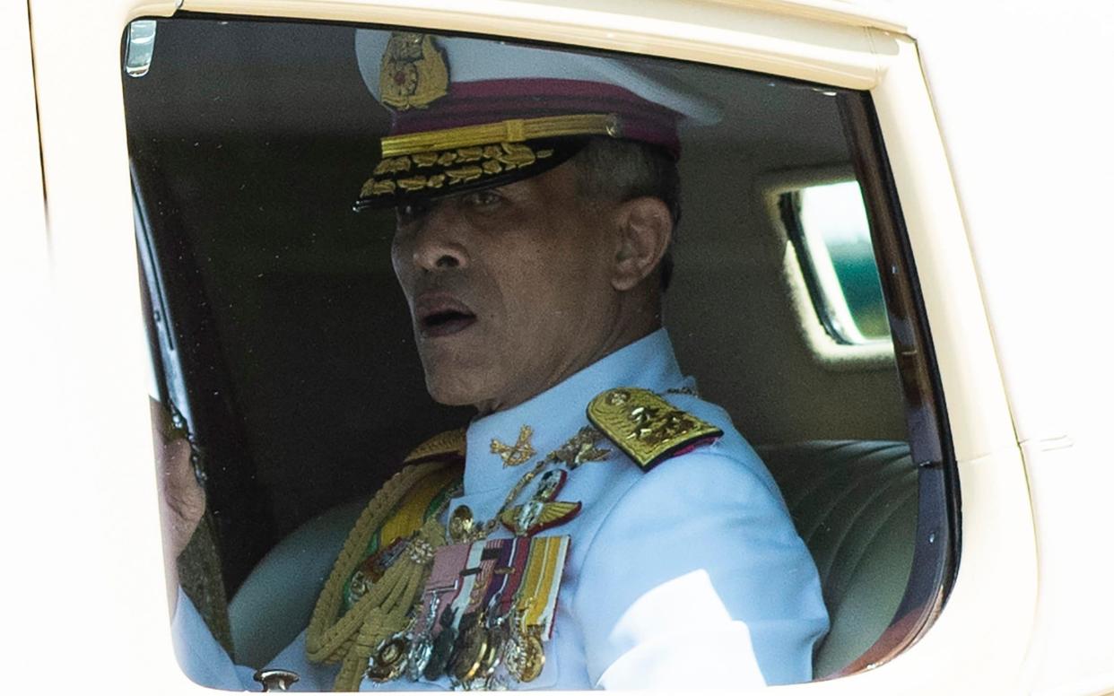 (FILES) In this file photo taken on May 4, 2019, Thailand's King Maha Vajiralongkorn arrives at the Grand Palace for his coronation in Bangkok. - A youth-led pro-democracy movement is set to make a massive stand in Bangkok on September 19, 2020 with an expected turnout of tens of thousands calling for PM Prayut Chan-O-Cha to step down and demanding reforms to the monarchy. (Photo by Jewel SAMAD / AFP) (Photo by JEWEL SAMAD/AFP via Getty Images) - JEWEL SAMAD/AFP