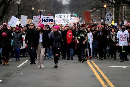 Protesters participating in the Women's March on Washington move up 17th Street Northwest after U.S. President Donald Trump's motorcade returned to the White House in Washington January 21, 2017. REUTERS/James Lawler Duggan