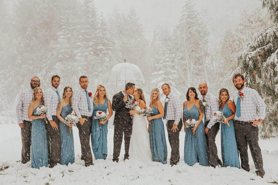 Sean and Brittany Tuohy were planning for an outdoor fall wedding in Washington. Instead, they got hit with a snowstorm on Sept. 28. Photographer Jaime Fletcher captured some unique photos of the occasion.