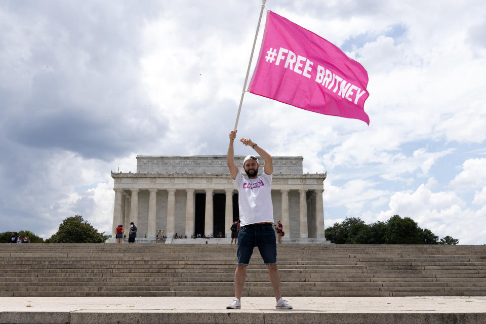 Fans and supporters of pop star Britney Spears protest at the Lincoln Memorial, during the "Free Britney" rally, Wednesday, July 14, 2021, in Washington. Rallies have been taking place across the country since the pop star spoke out against her conservatorship in court last month. (AP Photo/Jose Luis Magana)
