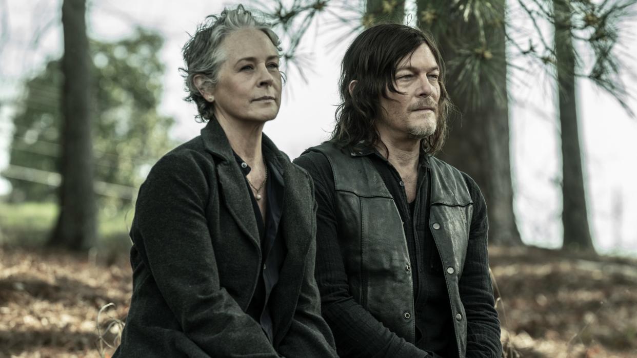  Norman Reedus as Daryl and Melissa McBride as Carol in The Walking Dead. 