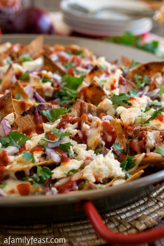 <p>A Family Feast</p><p>Fried, crisp tortillas are layered with a zesty tomato sauce, cooked pulled chicken, and shredded jack cheese. <a href="http://www.afamilyfeast.com/pulled-chicken-chilaquiles/" rel="nofollow noopener" target="_blank" data-ylk="slk:Get the recipe HERE;elm:context_link;itc:0;sec:content-canvas" class="link ">Get the recipe HERE</a>.</p>