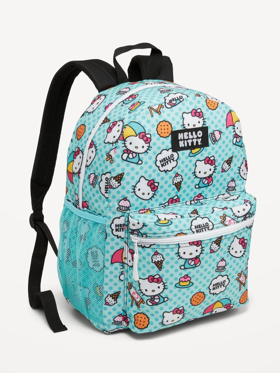 blue backpack with hello kitty head pattern