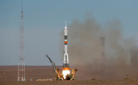 The Soyuz MS-10 spacecraft carrying the crew of astronaut Nick Hague of the U.S. and cosmonaut Alexey Ovchinin of Russia blasts off to the International Space Station (ISS) from the launchpad at the Baikonur Cosmodrome, Kazakhstan October 11, 2018. REUTERS/Shamil Zhumatov