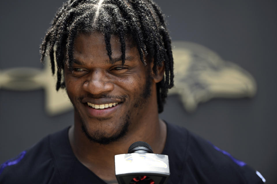 Baltimore Ravens quarterback Lamar Jackson answers questions from the media after NFL football team practice, Thursday, June 16, 2022, in Owings Mills, Md. (AP Photo/Gail Burton)