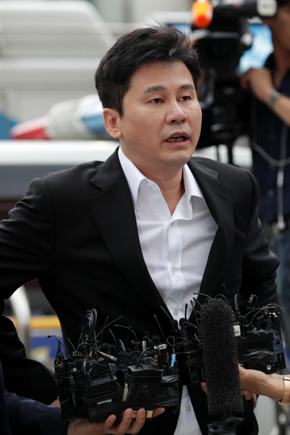 SEOUL, SOUTH KOREA - AUGUST 29: Yang Hyun-Suk, the former CEO of K-pop music label YG Entertainment arrives at police station on August 29, 2019 in Seoul, South Korea. The Seoul Metropolitan Police Agency has booked Yang Hyun-suk, the former CEO of K-pop music label YG Entertainment along with Seungri, a former member of K-pop boy band BIGBANG to be questioned over charges of gambling in a foreign country and securing the money in violation of South Korean law. (Photo by Han Myung-Gu/WireImage)