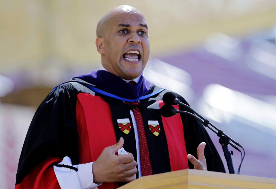 FILE- In this June 17, 2012 file photo, Newark N.J. Mayor Cory Booker delivers a commencement address during graduation ceremonies on the Stanford University campus in Stanford, Calif. In a 1992 column in The Stanford Daily, his college newspaper, Booker wrote that he was "disgusted by gays" before a transformative experience with a gay peer counselor changed his views. (AP Photo/Paul Sakuma)