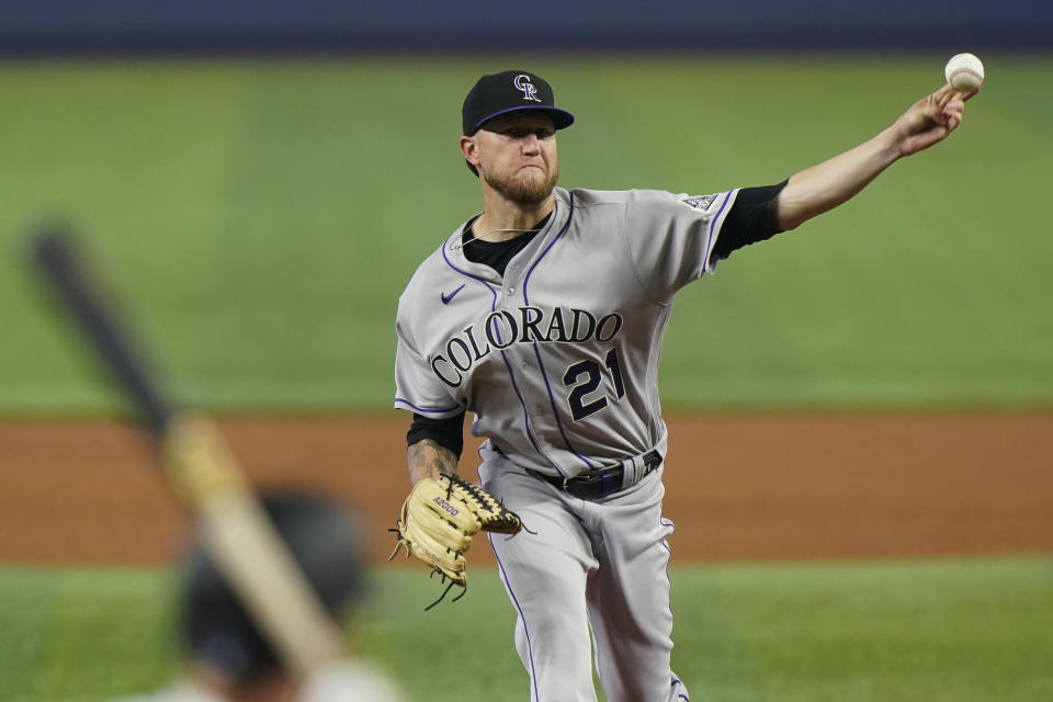 Colorado Rockies' Kyle Freeland pitches to Miami Marlins' Jon Berti during the first inning of a baseball game, Thursday, June 23, 2022, in Miami. (AP Photo/Wilfredo Lee)