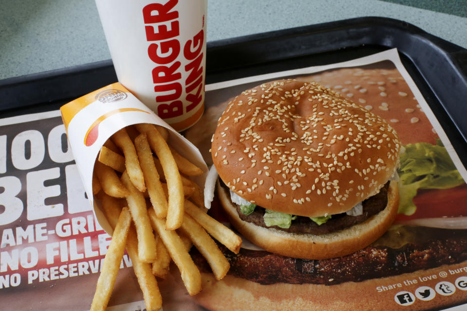 FILE- This Feb. 1, 2018, file photo shows a Burger King Whopper meal combo at a restaurant in Punxsutawney, Pa. Restaurant Brands International, the parent company of Burger King and Tim Hortons, reports financial results Monday, Feb. 11, 2019. (AP Photo/Gene J. Puskar, File)