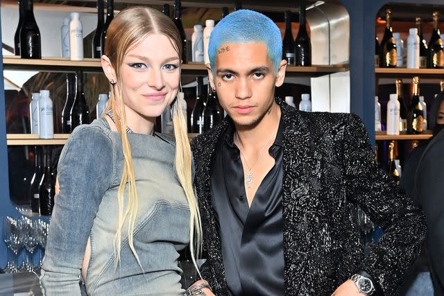 <p>Stefanie Keenan/VF22/WireImage</p> Hunter Schafer and Dominic Fike attend the 2022 Vanity Fair Oscar Party