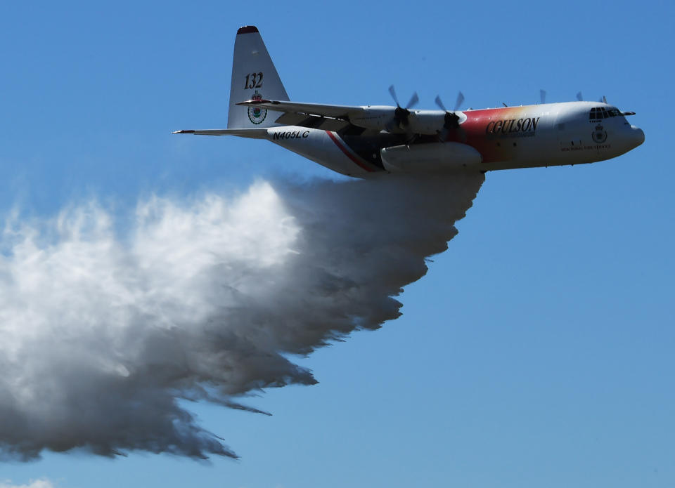 The US firefighters were flying a C-130 aircraft, similar to the one pictured, in southern NSW.