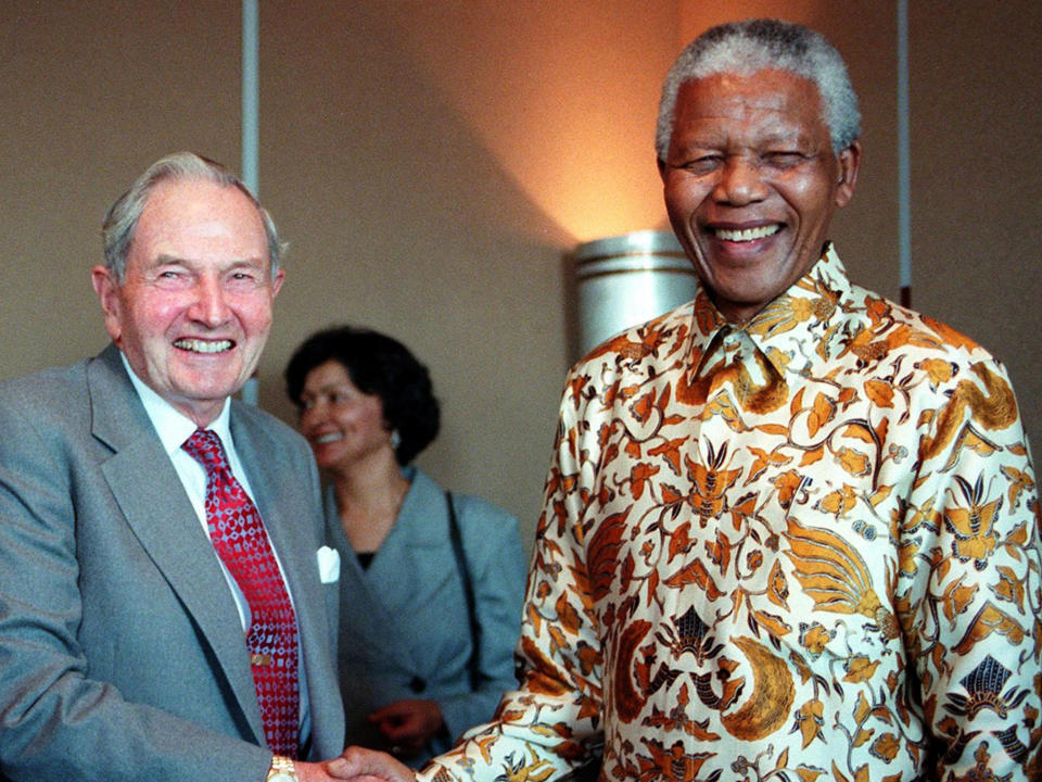 David Rockefeller, who died this week aged 101, and Nelson Mandela, in 1998: Getty