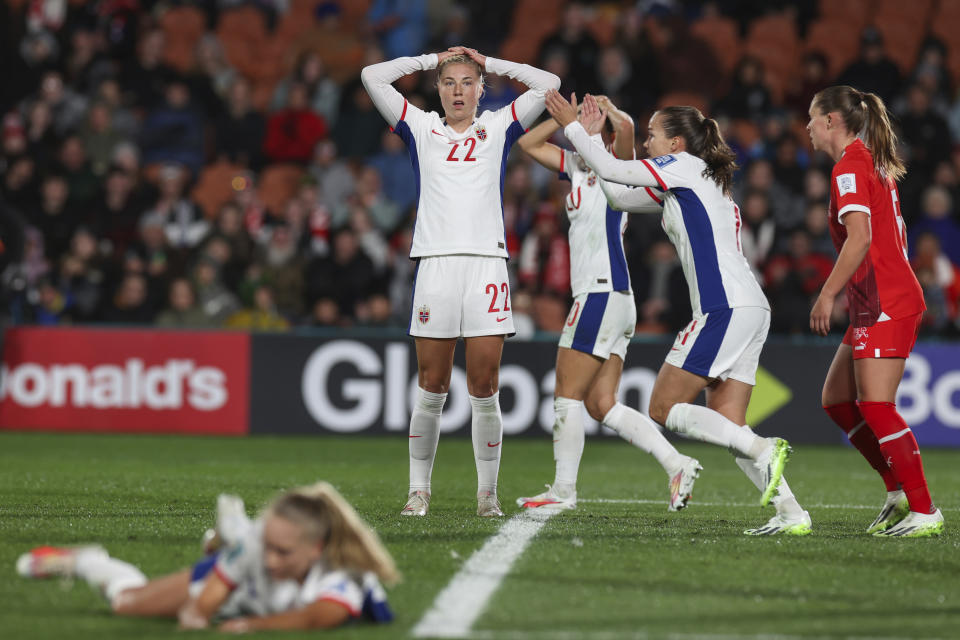 Norway's Sophie Roman Haug, center, reacts to a missed chance on goal during the Group A Women's World Cup soccer match between Switzerland and Norway in Hamilton, New Zealand, Tuesday, July 25, 2023. (AP Photo/Juan Mendez)