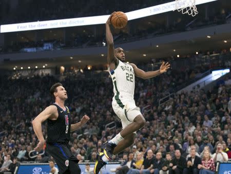 Mar 28, 2019; Milwaukee, WI, USA; Milwaukee Bucks forward Khris Middleton (22) drives for a shot during the first quarter against the LA Clippers at Fiserv Forum. Mandatory Credit: Jeff Hanisch-USA TODAY Sports