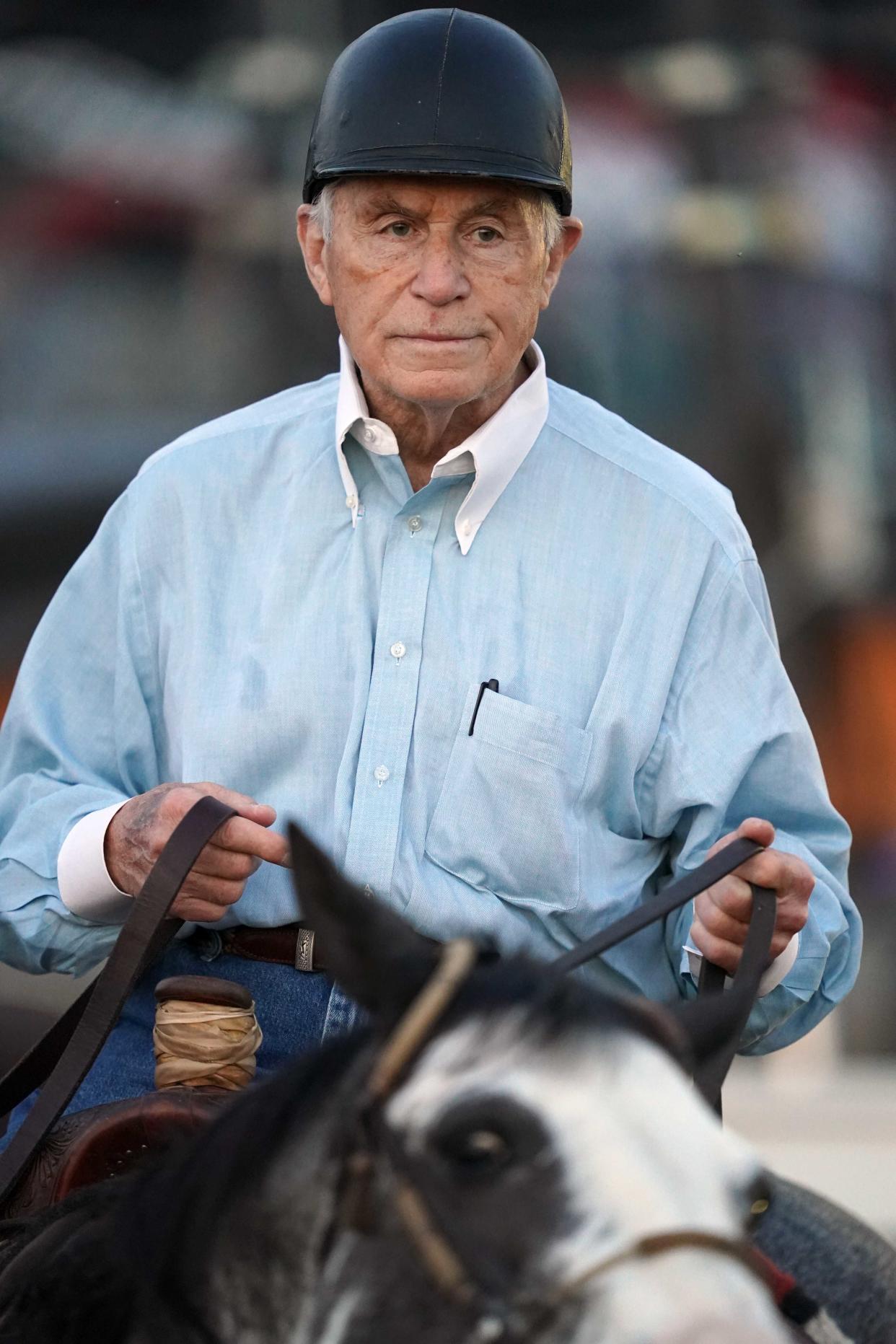 May 21, 2022; Baltimore, MD, USA; D. Wayne Lukas during morning workouts prior to the Preakness Stakes at Pimlico Race Course. Mandatory Credit: Mitch Stringer-USA TODAY Sports