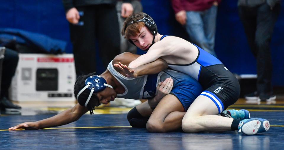 Richard Wood, the lightweight wrestler on the right, helped Brockport win the Monroe County Division 3 title to get into the Section V Dual Meet Division I Wrestling Championships.