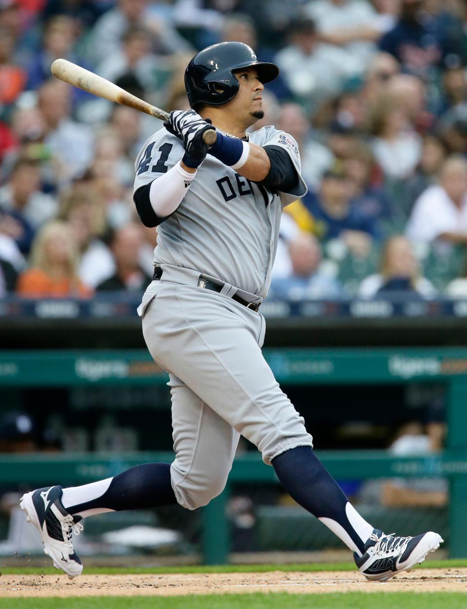 Detroit Tigers' Victor Martinez watches his sacrifice fly ball against the St. Louis Cardinals during the first inning Saturday, Sept. 8, 2018, in Detroit.