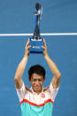 Tennis - Brisbane International - Men's Final - Pat Rafter Arena, Brisbane, Australia, January 6, 2019 Japan's Kei Nishikori celebrates with the trophy after winning the final against Russia's Daniil Medvedev REUTERS/Patrick Hamilton