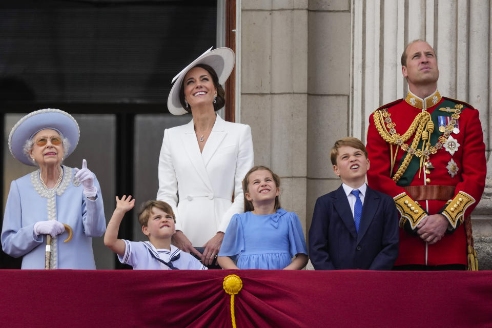 Queen Elizabeth II, from left, Prince Louis, Kate, Duchess of Cambridge, Princess Charlotte, Prince George and Prince William stand on the balcony of Buckingham Palace, London, Thursday June 2, 2022, on the first of four days of celebrations to mark the Platinum Jubilee. This was the year war returned to Europe, and few facets of life were left untouched. Russia’s invasion of its neighbor Ukraine unleashed misery on millions of Ukrainians, shattered Europe’s sense of security, ripped up the geopolitical map and rocked the global economy. The shockwaves made life more expensive in homes across Europe, worsened a global migrant crisis and complicated the world’s response to climate change. (Alastair Grant/Pool Photo via AP)