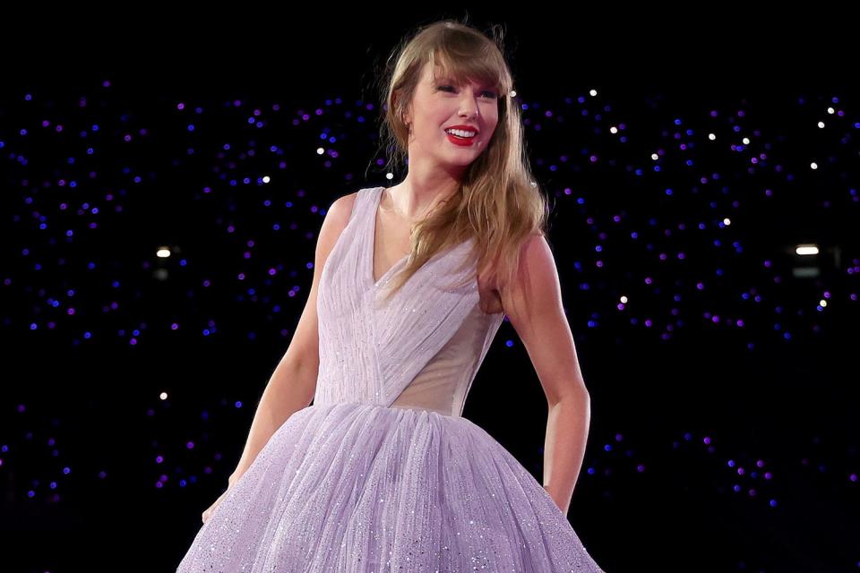 <p>Graham Denholm/TAS24/Getty</p> Taylor Swift performing the Eras Tour in Melbourne, Australia