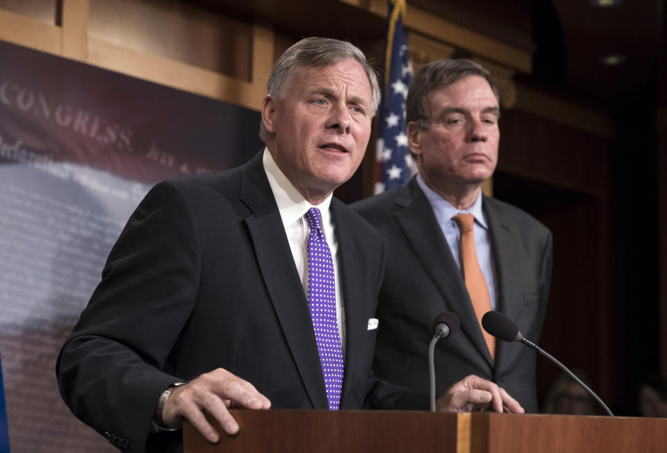 Senate Select Committee on Intelligence Chairman Richard Burr, R-N.C., left, and Vice Chairman Mark Warner, D-Va., update reporters on the status of their inquiry into Russian interference in the 2016 U.S. elections on Oct. 4. (Photo: J. Scott Applewhite/AP)