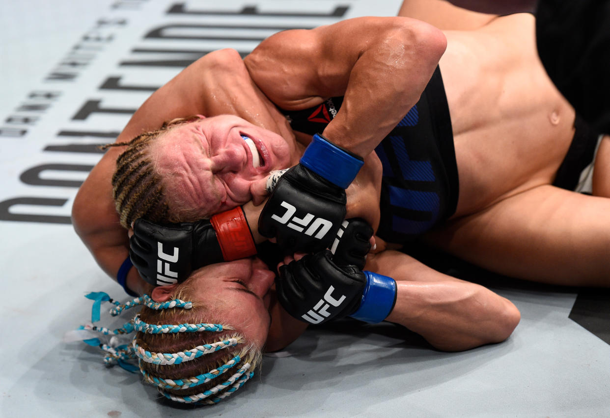 Justine Kish fought off Felice Herrig's rear choke submission attempt but didn't escape an embarrassing accident in the octagon. (Photo: Brandon Magnus/Zuffa LLC via Getty Images)