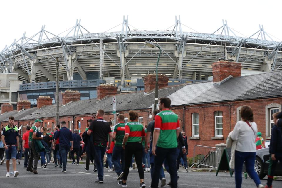 Fans arriving at Croke Park, Dublin, ahead of Tyrone taking on Mayo in the All Ireland football final (Damien Storan/PA) (PA Wire)
