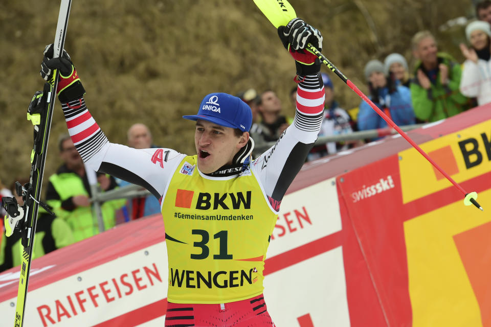 First placed Austria's Matthias Mayer celebrates at the end of an alpine ski, men's World Cup combined in Wengen, Switzerland, Friday, Jan. 17, 2020. (AP Photo/Marco Tacca)