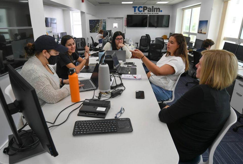 Cheryl Smith (right), one of several newsroom editors at Treasure Coast Newspapers and TCPalm, facilitates a team meeting with staff reporters (clockwise from left) Lindsey Leake, Lina Ruiz, Gianna Montesano and Olivia McKelvey at the discussion table on the west side of the newsroom on Wednesday, June 29, 2022, in Fort Pierce. The open newsroom design helps facilitate collaboration between staff members.