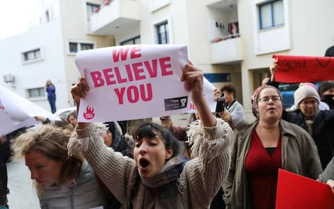 Activists take part in a demonstration, after a British woman was found guilty of faking a rape claim, outside the Famagusta courthouse in Paralimni - Credit: Reuters