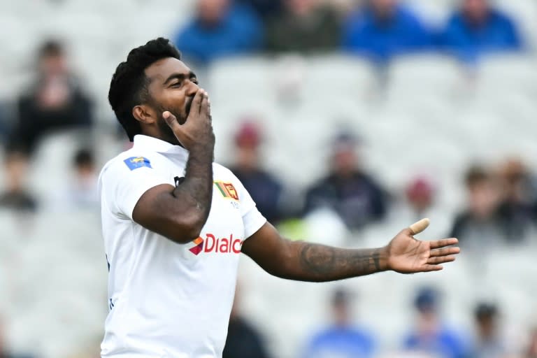 Enjoyed that: Sri Lanka's Asitha Fernando blows a kiss as he celebrates his dismissal of England captain Ollie Pope in the first Test at Old Trafford (Paul ELLIS)