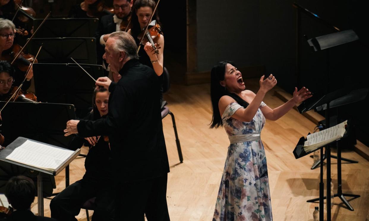 <span>Panache … Sir Mark Elder and Eri Nakamura perform the original version of Verdi’s Simon Boccanegra.</span><span>Photograph: David Hughes / The Hallé</span>