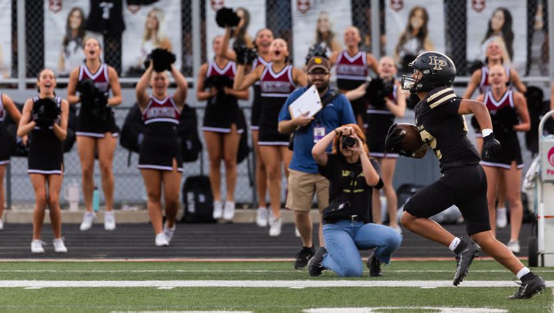 Lone Peak’s Jasean Mayberry runs down the field for a touchdown at the team’s high school football season opener against Bingham at Lone Peak High School in Highland on Thursday, Aug. 10, 2023. Lone Peak won the game 27-7.