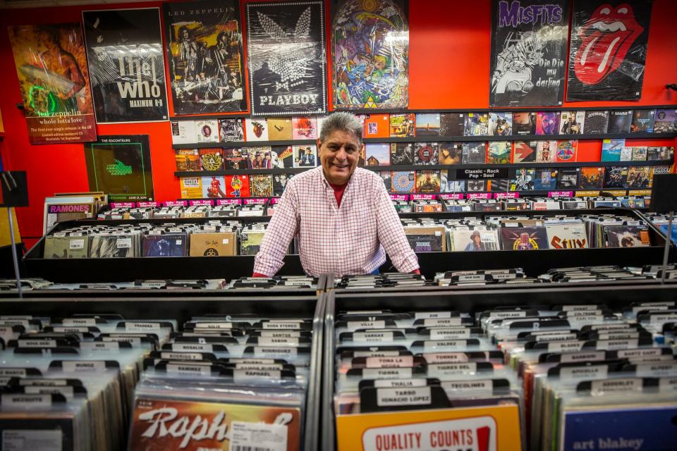 George Reynoso, owner of All That Music & Video, is photographed at his store at The Fountains at Farah. The store will double in size in about three months after a temporary move to a nearby site.