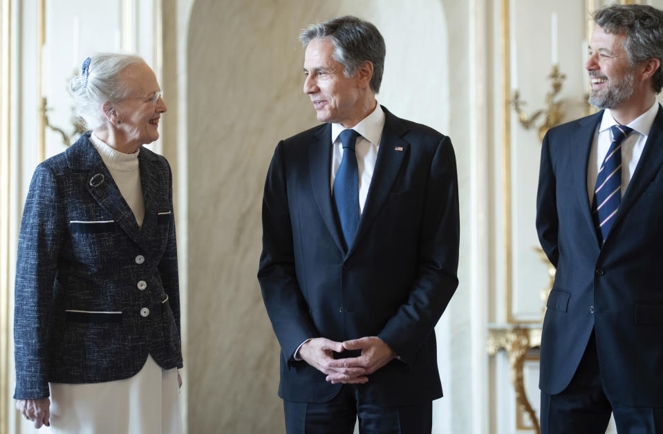 Denmark's Queen Margrethe II, left and Crown Prince Frederik, right, welcome US Secretary of State Antony Blinken, at Amalienborg Palace in Copenhagen, Denmark, Monday, May 17, 2021. Blinken is in Denmark for talks on climate change, Arctic policy and Russia as calls grow for the Biden administration to take a tougher and more active stance on spiraling Israeli-Palestinian violence. (Saul Loeb/Pool Photo via AP)