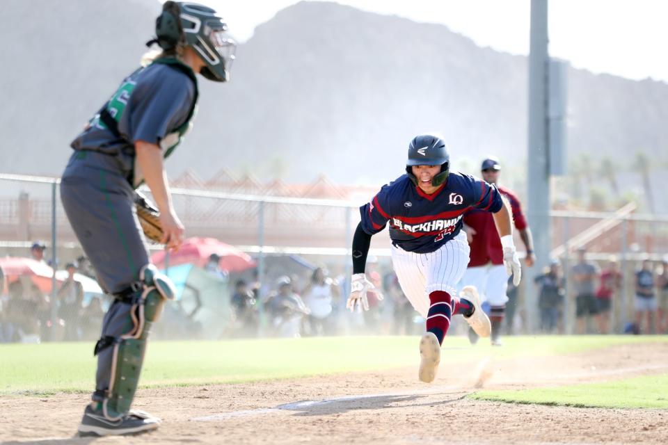 Abraham Calderon of La Quinta High scores the winning run against Monrovia in their Division 3 CIF-SS playoff game in La Quinta, Calif., on May 10, 2022.