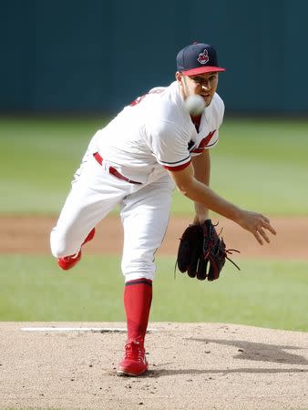 Jun 23, 2018; Cleveland, OH, USA; Cleveland Indians starting pitcher Trevor Bauer (47) throws the first pitch of the game to Detroit Tigers Leonys Martin (12) at Progressive Field. Mandatory Credit: Scott R. Galvin-USA TODAY Sports