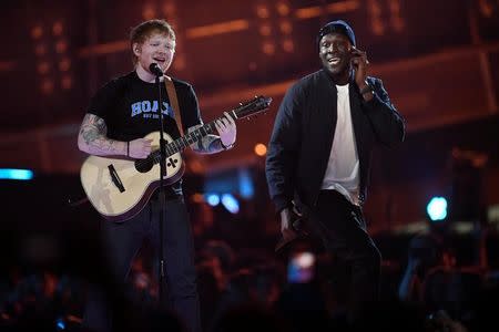 FILE PHOTO: Ed Sheeran and Stormzy perform at the Brit Awards at the O2 Arena in London, Britain, February 22, 2017. REUTERS/Toby Melville/File Photo