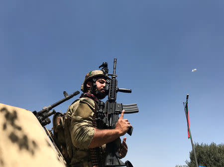 A member of the Afghan security forces keeps watch at the site of an attack in Kabul, Afghanistan August 21, 2018. REUTERS/Mohammad Ismail