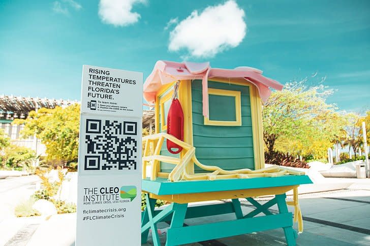 This melting lifeguard tower illustrates the direct impact of global warming on Florida's beaches and tourism industry.