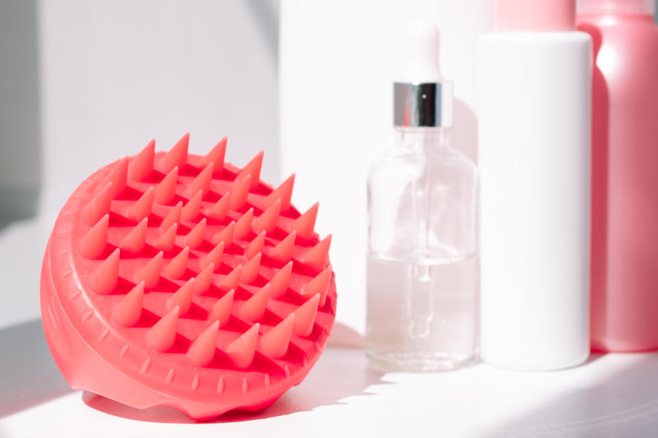 close up of scalp brush massager