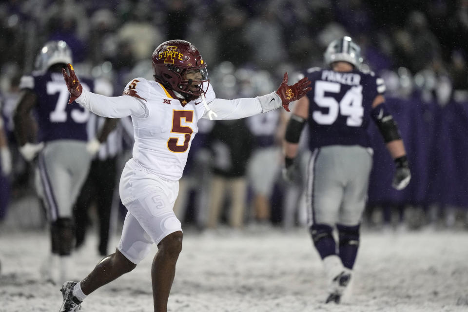 Iowa State defensive back Myles Purchase (5) celebrate after Kansas State turned the ball over on downs during the second half of an NCAA college football game Saturday, Nov. 25, 2023, in Manhattan, Kan. Iowa State won 42-35. (AP Photo/Charlie Riedel)