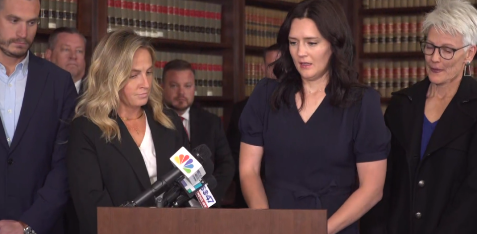 Kirsten Bridegan, surrounded by family, supporters and law enforcement, responds to the March 16, 2023, arrest of Mario Fernandez Saldana in her husband Jared's shooting death in Jacksonville Beach.